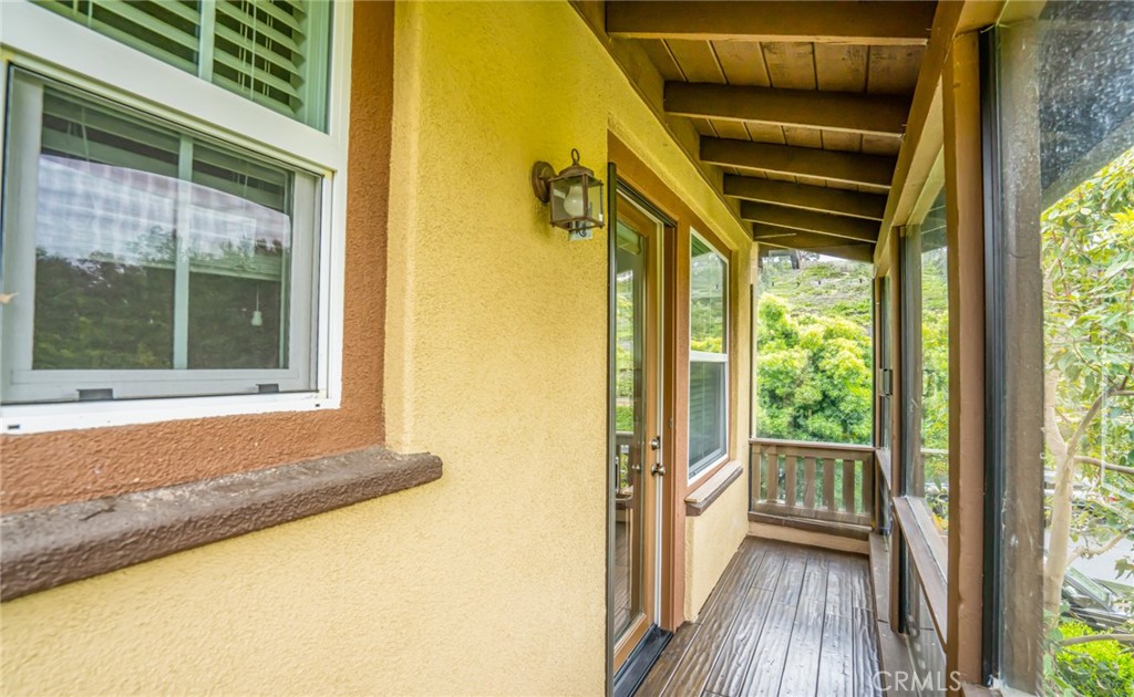 233 Danbrook Irvine, CA 92603 - Photo 27 of 32 a view of a room with wooden floor and windows