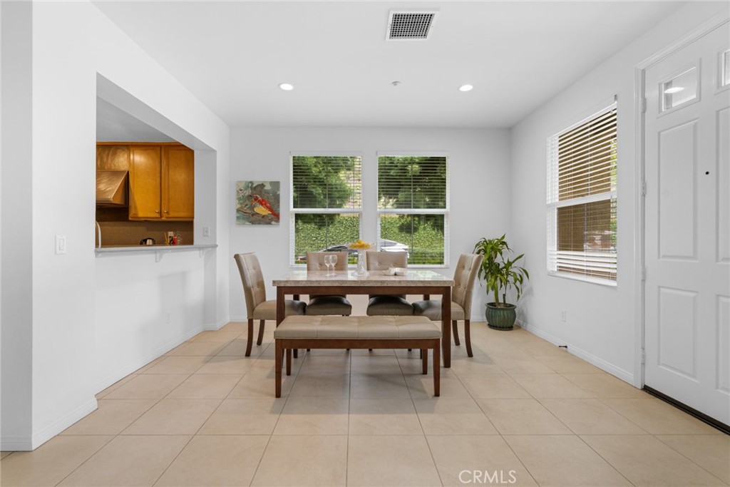 233 Danbrook Irvine, CA 92603 - Photo 30 of 32 a dining room with furniture and window