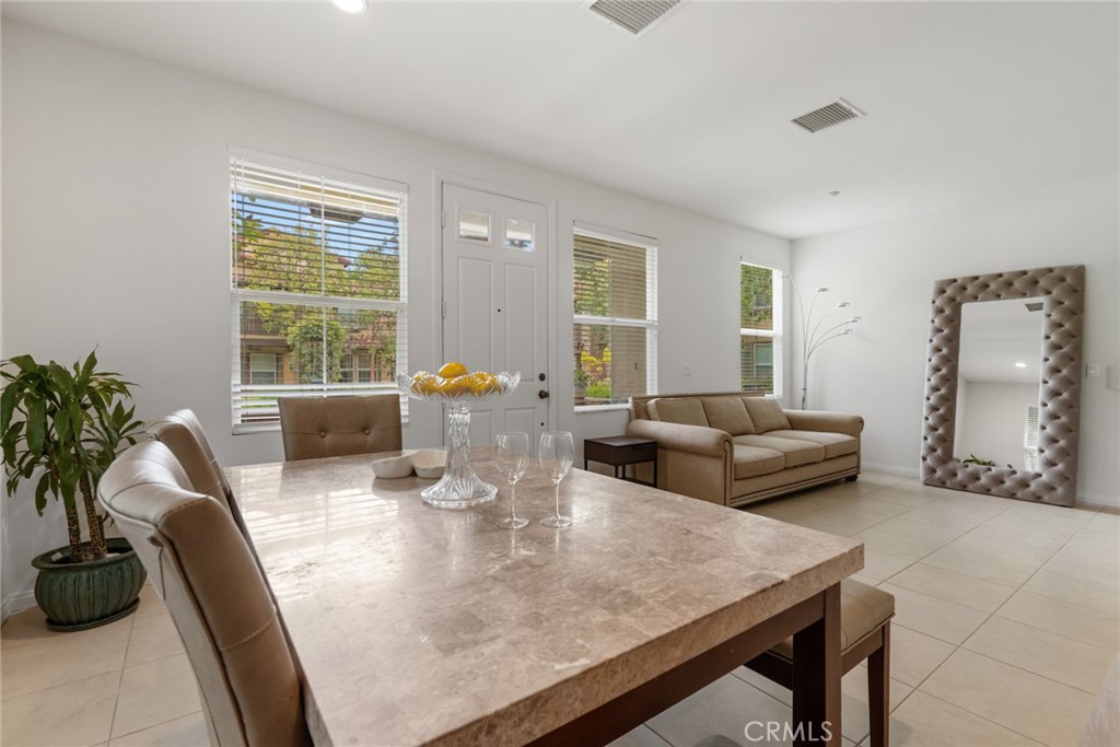 233 Danbrook Irvine, CA 92603 - Photo 31 of 32 a living room with furniture and a potted plant