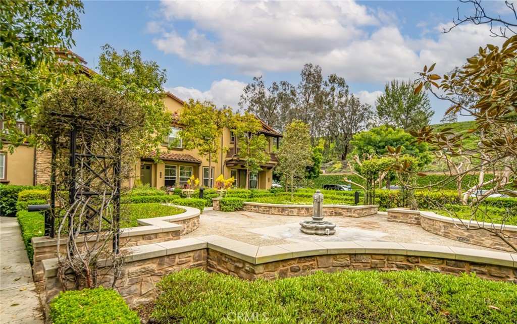 233 Danbrook Irvine, CA 92603 - Photo 5 of 32 a view of a swimming pool with a patio