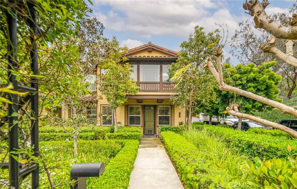 233 Danbrook Irvine, CA 92603 - Photo 6 of 32 a front view of a house with garden
