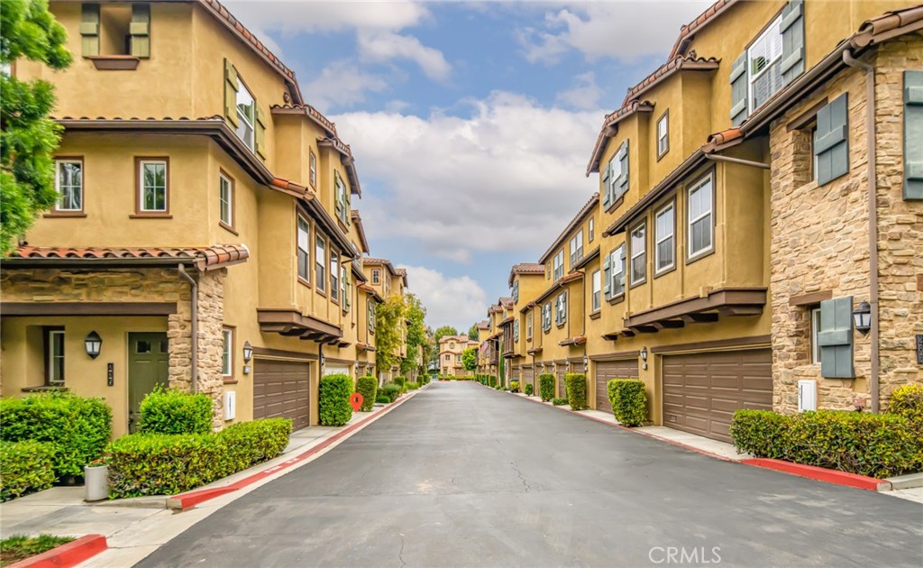 233 Danbrook Irvine, CA 92603 - Photo 9 of 32 a view of a building with a street