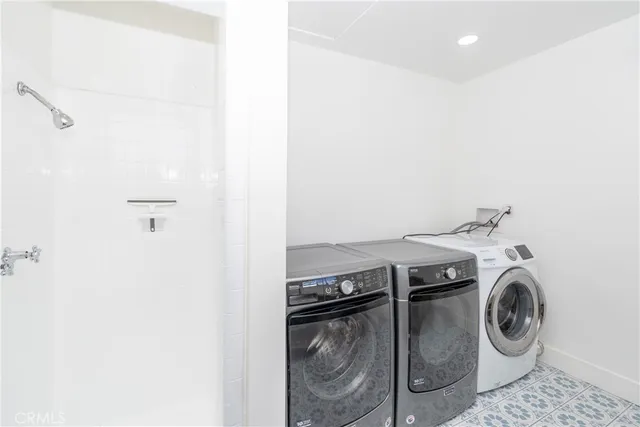 a bathroom with a sink and vanity
