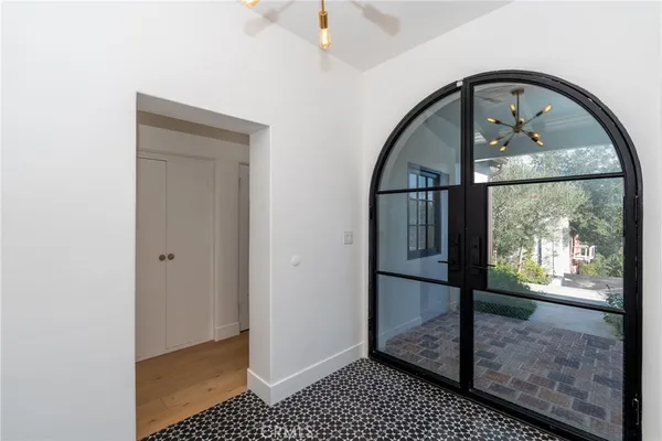 a large white room with a large window