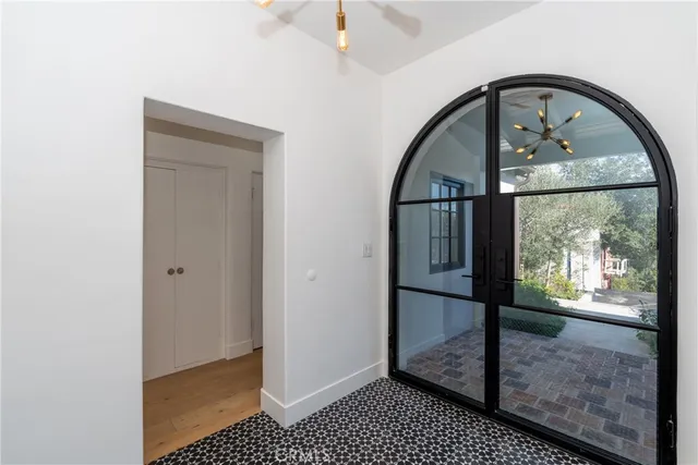 a large white room with a large window