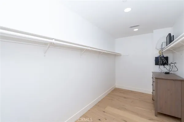 a view of a room with wall and white walls