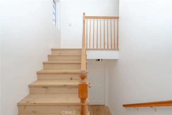 a view of a house with backyard and porch