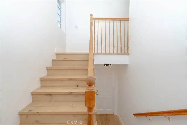 a view of a house with backyard and porch