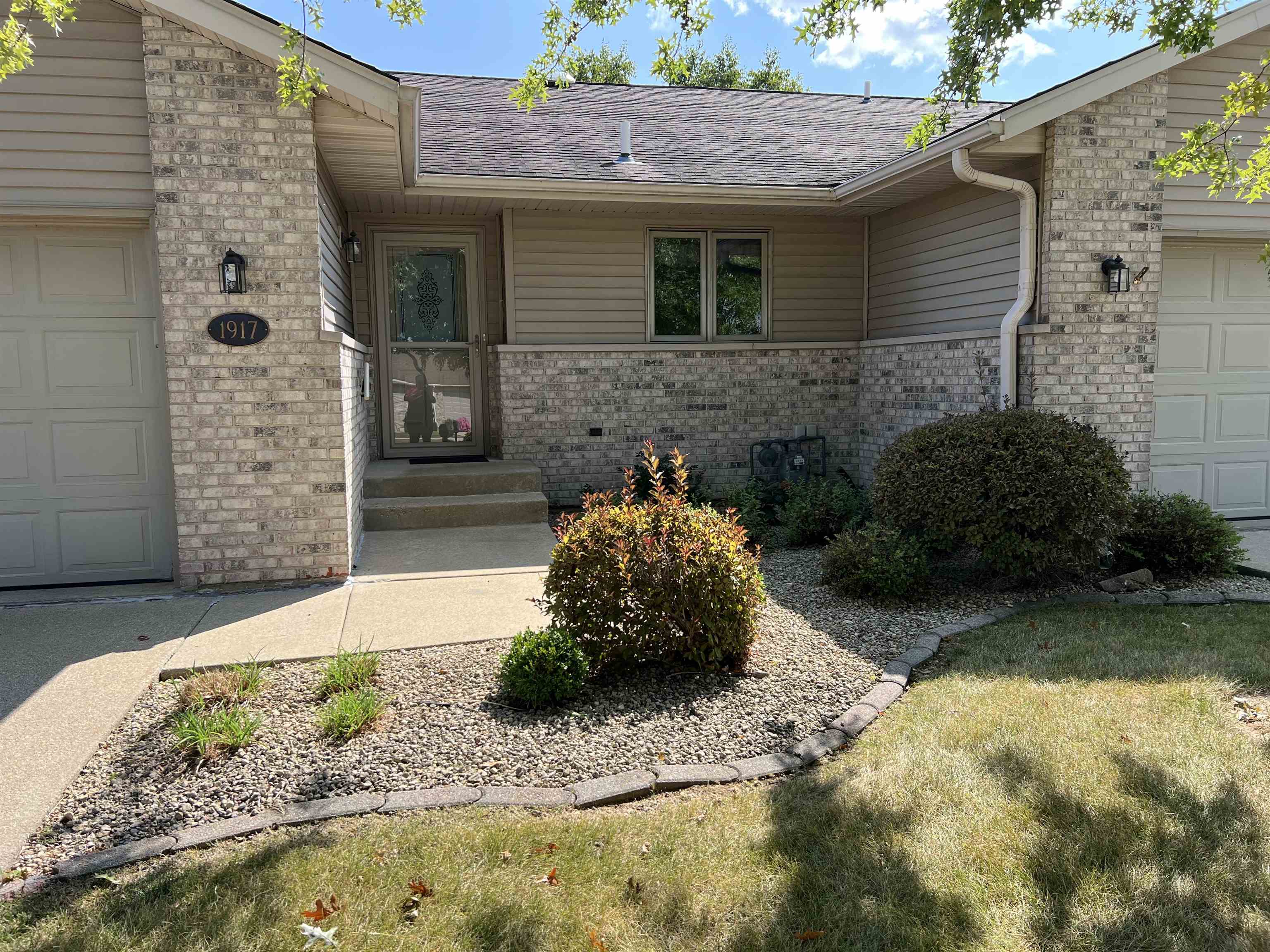1917 Comanche Court Freeport, IL 61032 - Photo 2 of 25 a front view of a house with a yard