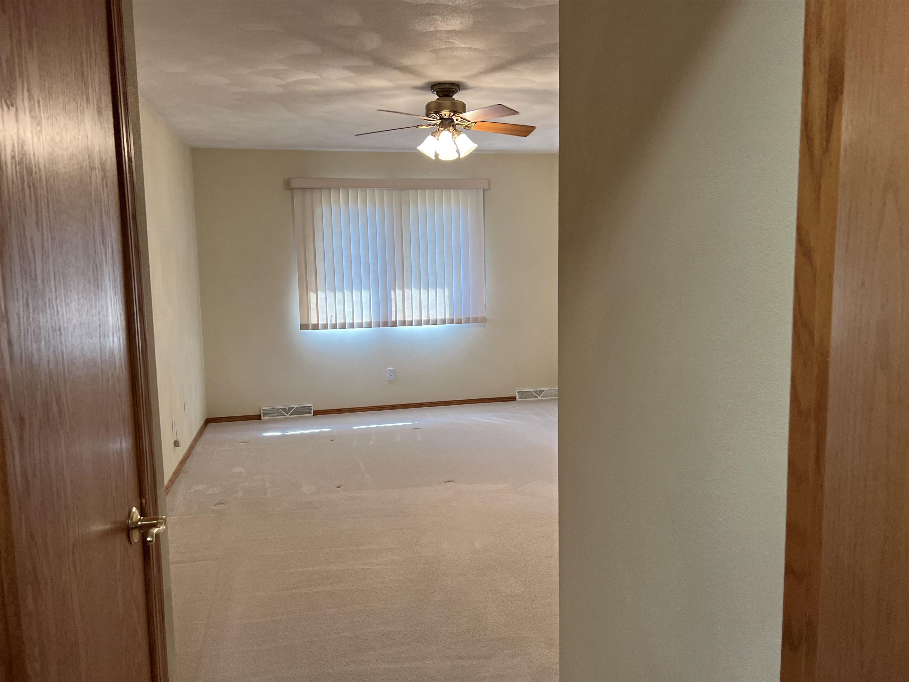1917 Comanche Court Freeport, IL 61032 - Photo 22 of 25 an empty room with windows and closet