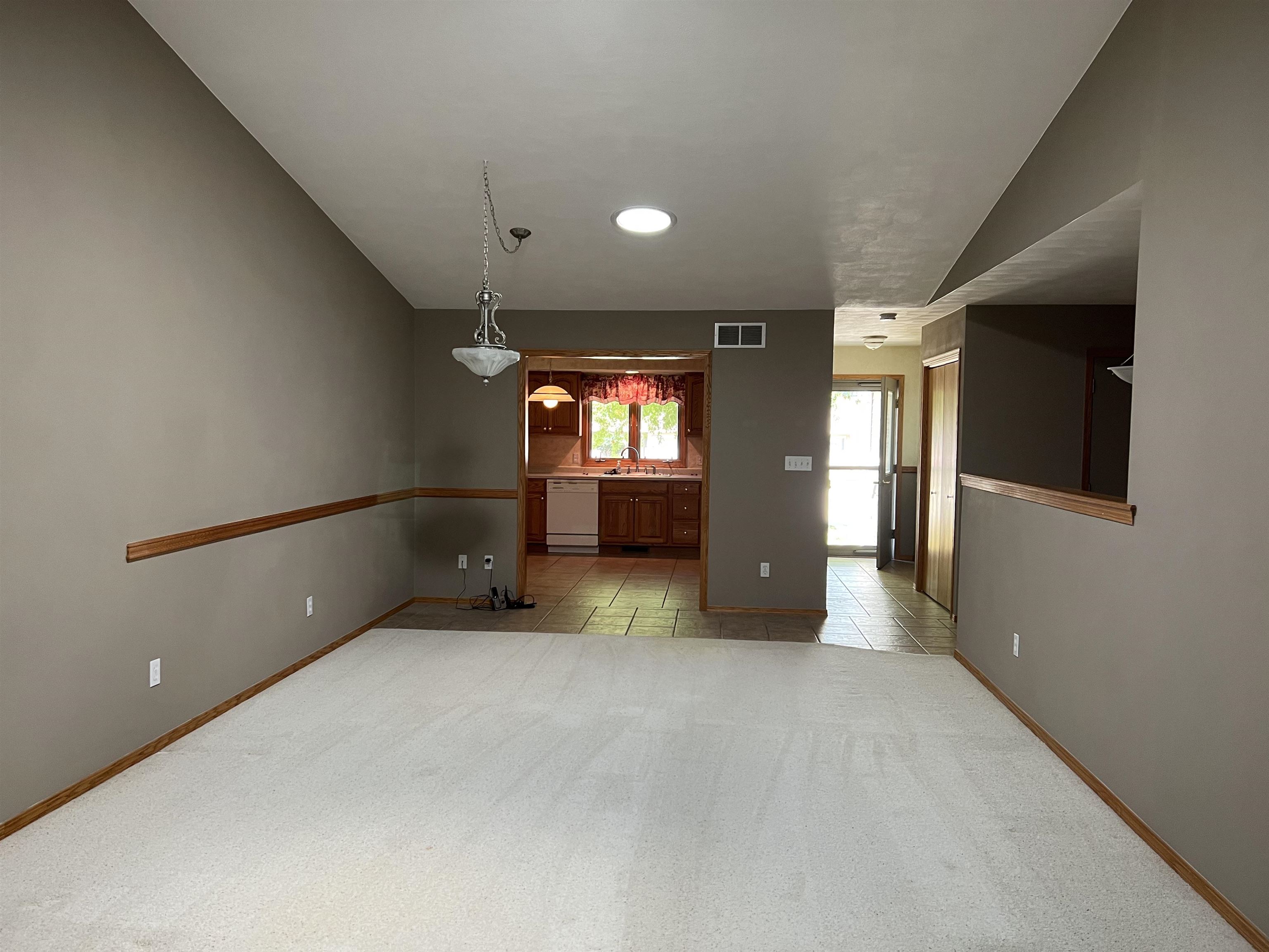 1917 Comanche Court Freeport, IL 61032 - Photo 8 of 25 a view of an empty room with a window