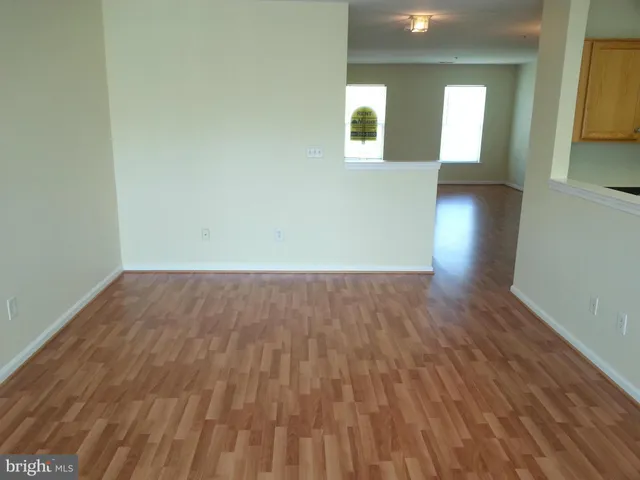 a view of livingroom with hardwood and window