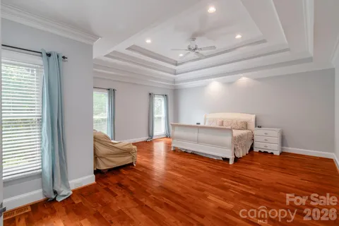 a view of room with wooden floor