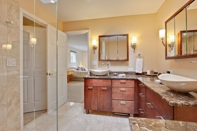 211 Washington Road Lake Forest, IL 60045 - Photo 11 of 26 a bathroom with a granite countertop sink and a mirror