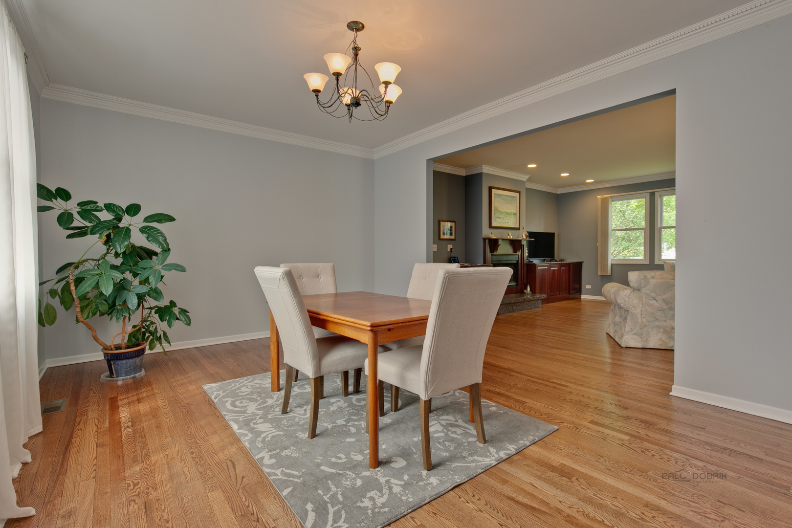 211 Washington Road Lake Forest, IL 60045 - Photo 20 of 26 a view of a dining room with furniture wooden floor and chandelier