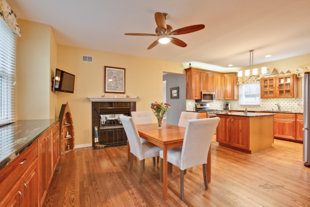 211 Washington Road Lake Forest, IL 60045 - Photo 3 of 26 a dining room with furniture and wooden floor