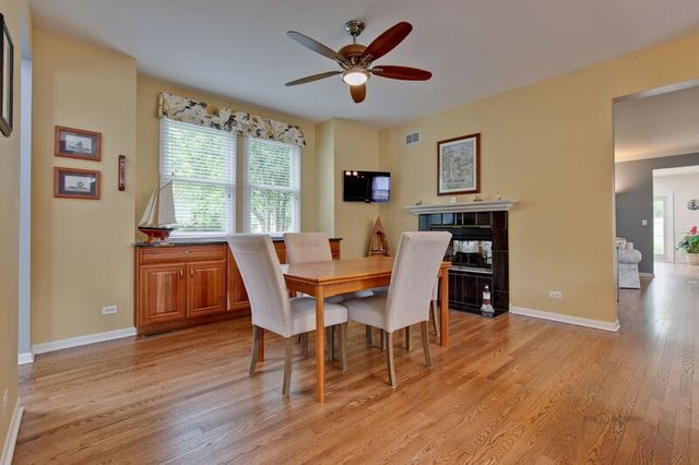 211 Washington Road Lake Forest, IL 60045 - Photo 4 of 26 a dining room with furniture and window