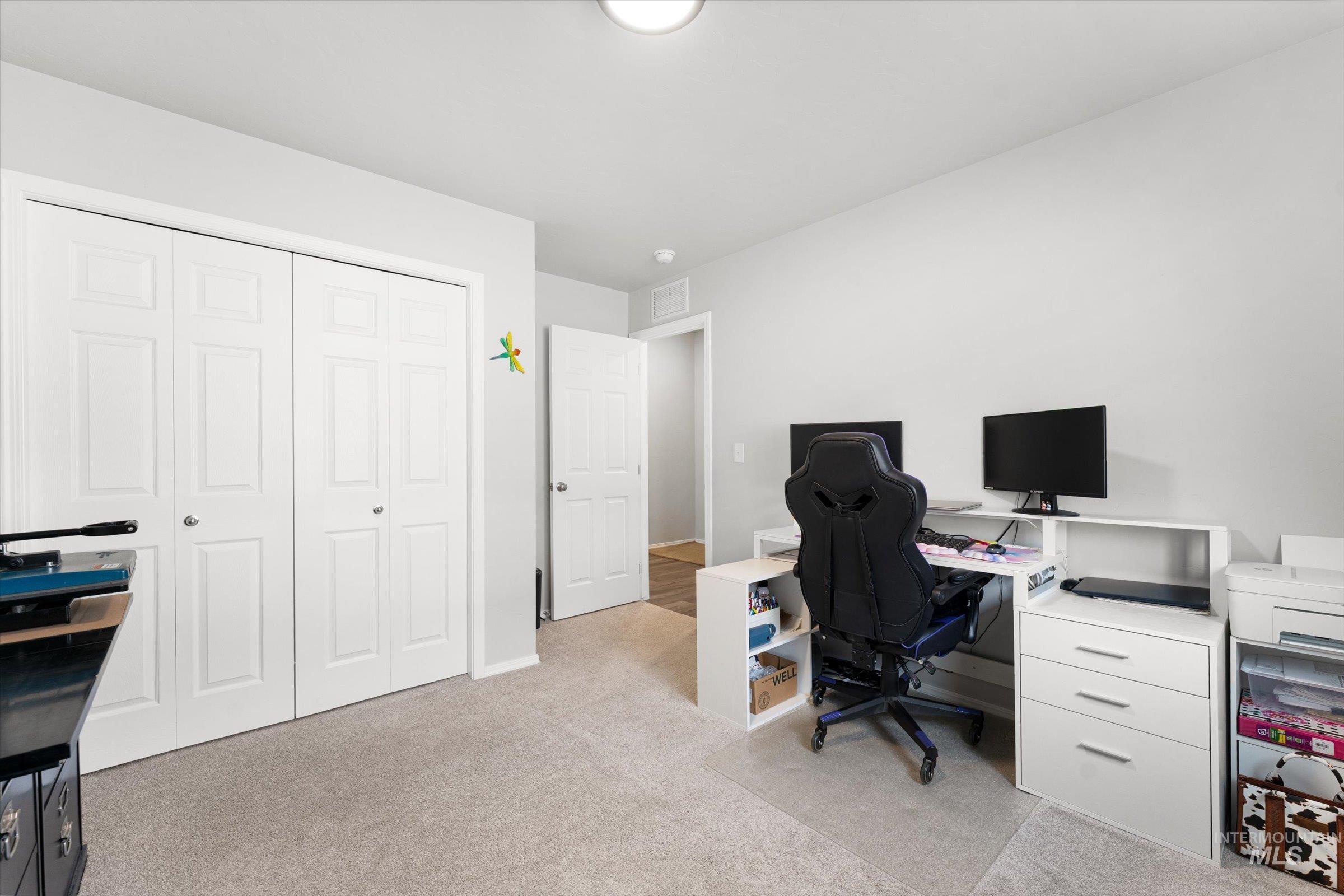 12798 Devonshire Street Caldwell, ID 83607 - Photo 21 of 42 Office space with light colored carpet and baseboards