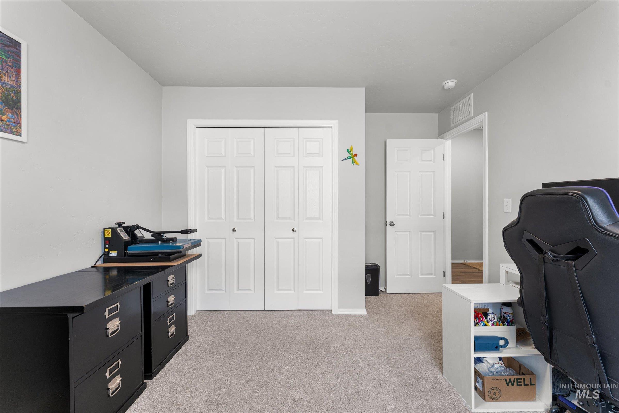 12798 Devonshire Street Caldwell, ID 83607 - Photo 22 of 42 Office with light colored carpet