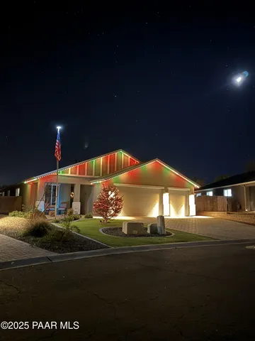 a front view of a house with yard