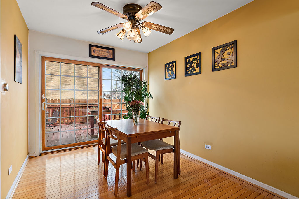 8000 West Lyons Street Niles, IL 60714 - Photo 4 of 14 a view of a dining room with furniture window and wooden floor