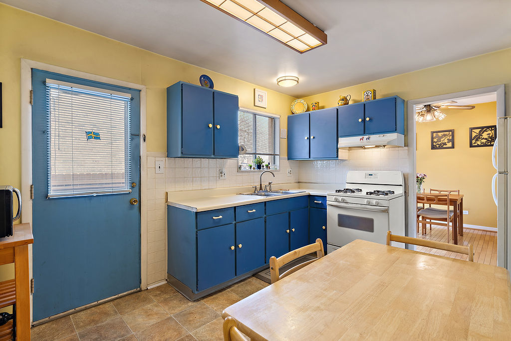 8000 West Lyons Street Niles, IL 60714 - Photo 5 of 14 a kitchen with stainless steel appliances granite countertop a sink stove and refrigerator