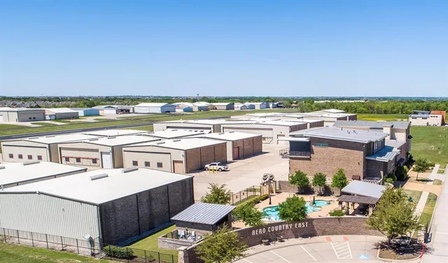 a view of a balcony with chairs and a table