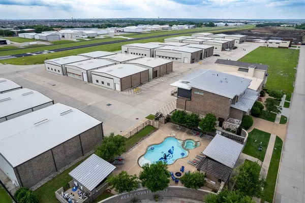 an aerial view of a house with a ocean view