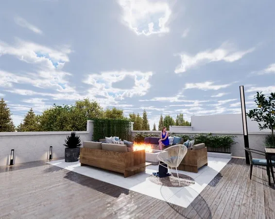 a view of a terrace with furniture and a terrace view