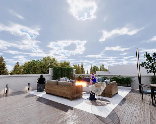 a view of a terrace with furniture and a terrace view