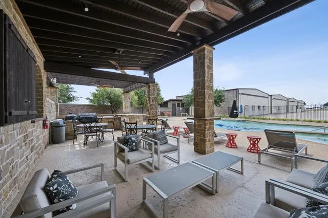 a outdoor space with lots of tables and chairs