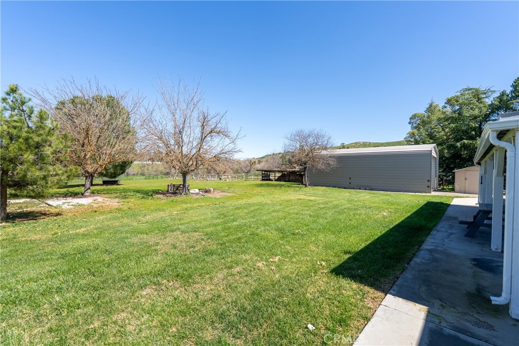 6446 Windmill Place Paso Robles, CA 93446 - Photo 25 of 44 a view of yard with swimming pool