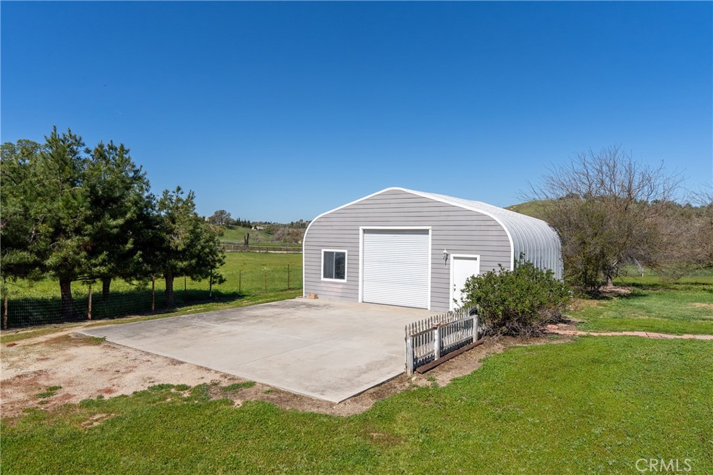 6446 Windmill Place Paso Robles, CA 93446 - Photo 27 of 44 a front view of a house with garden