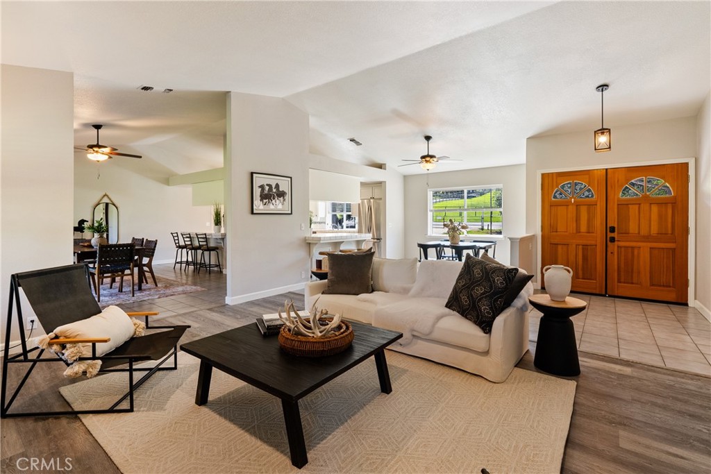 6446 Windmill Place Paso Robles, CA 93446 - Photo 5 of 44 a living room with furniture and wooden floor