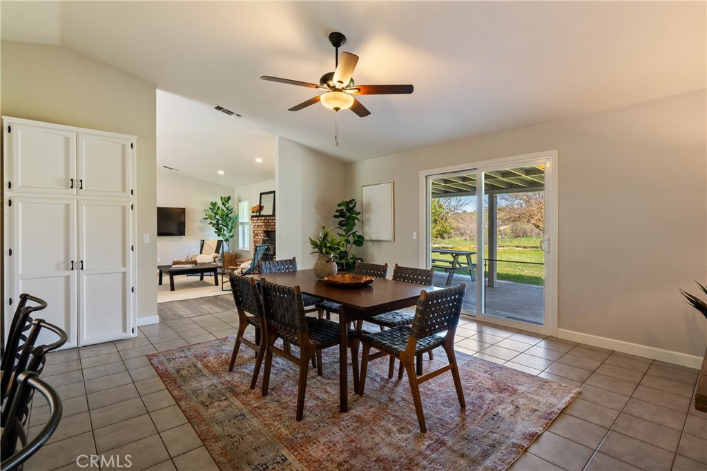 6446 Windmill Place Paso Robles, CA 93446 - Photo 10 of 44 a view of a dining room with furniture window and outside view