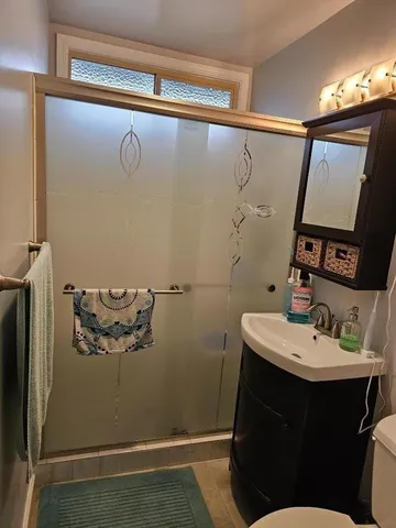 a bathroom with a sink and mirror