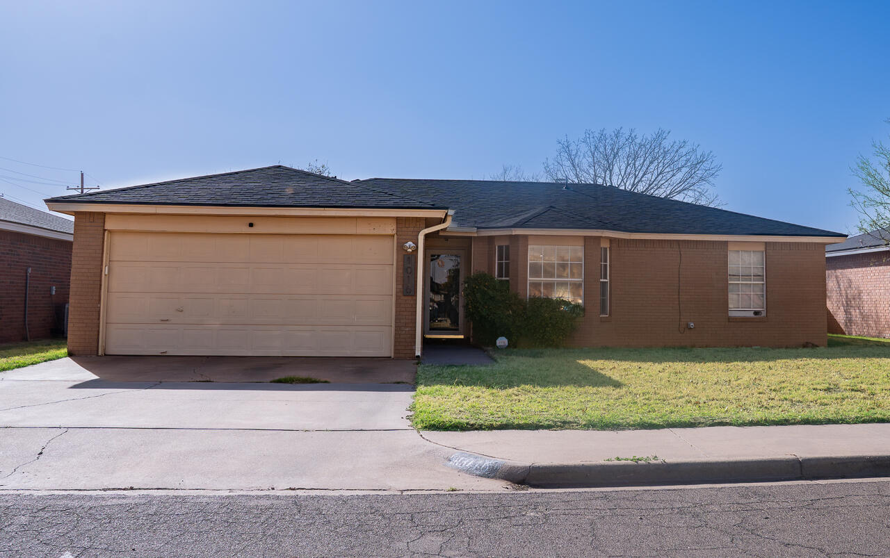 1016 Ironton Avenue Lubbock, TX 79416 - Photo 1 of 29 a front view of a house with a yard