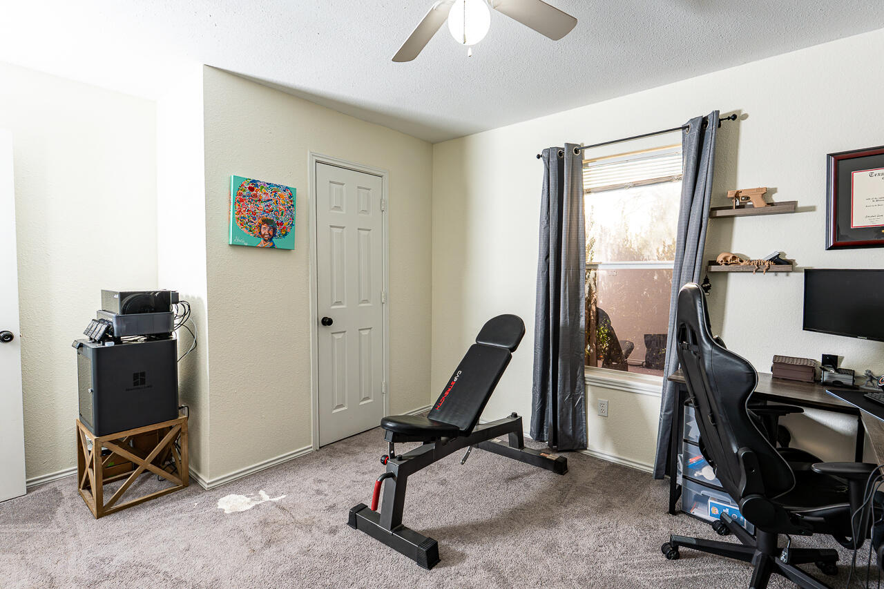 1016 Ironton Avenue Lubbock, TX 79416 - Photo 11 of 29 a view of a workspace with furniture