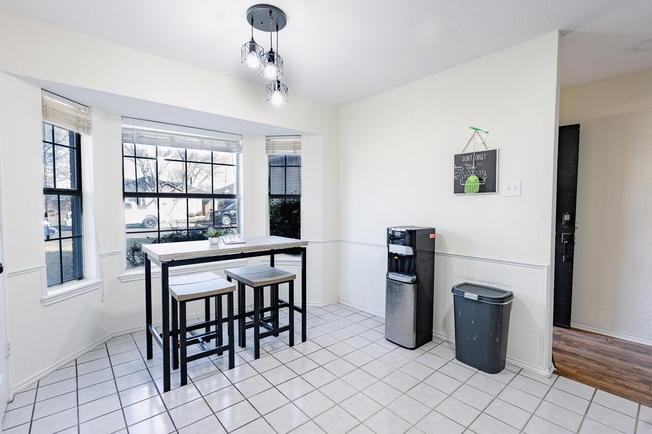 1016 Ironton Avenue Lubbock, TX 79416 - Photo 23 of 29 a view of a dining room with furniture