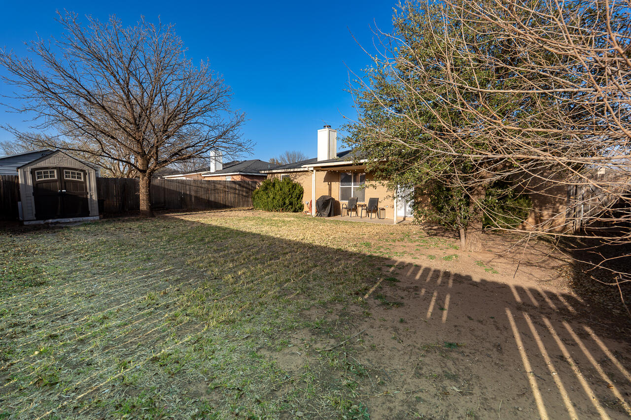 1016 Ironton Avenue Lubbock, TX 79416 - Photo 25 of 29 a view of a yard with a house