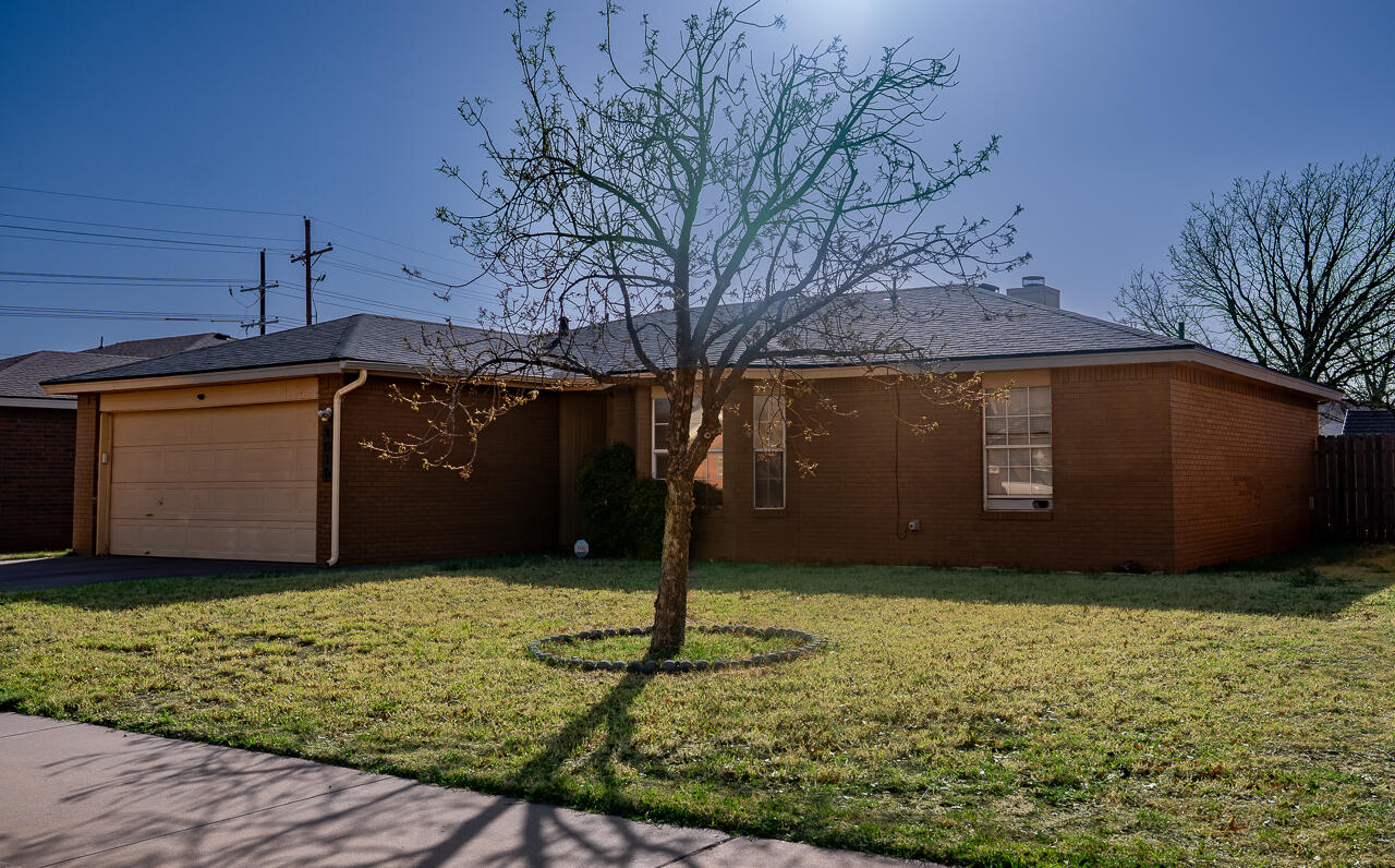 1016 Ironton Avenue Lubbock, TX 79416 - Photo 3 of 29 a front view of a house with a yard
