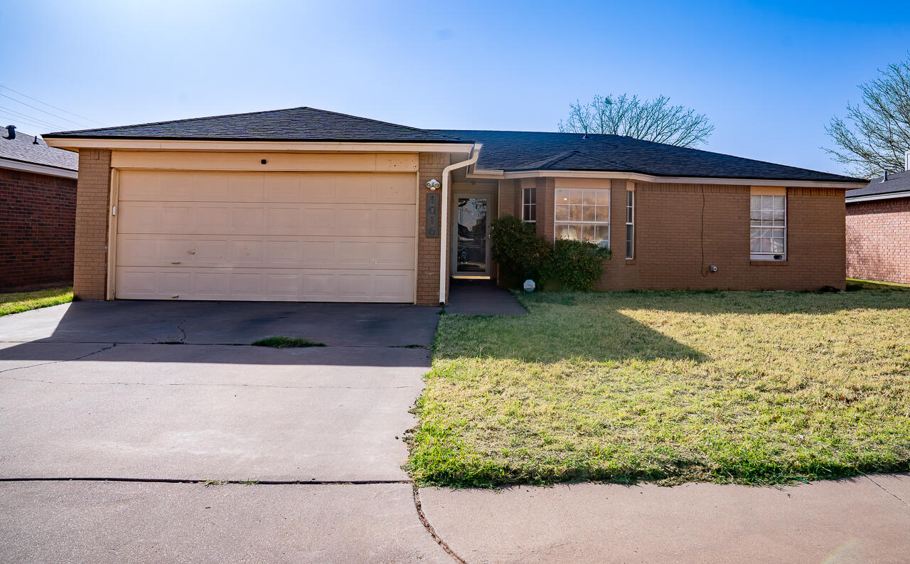 1016 Ironton Avenue Lubbock, TX 79416 - Photo 4 of 29 a front view of a house with garden