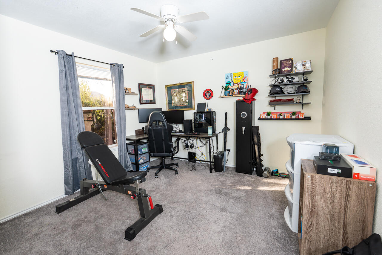 1016 Ironton Avenue Lubbock, TX 79416 - Photo 10 of 29 a view of a workspace with furniture and a window