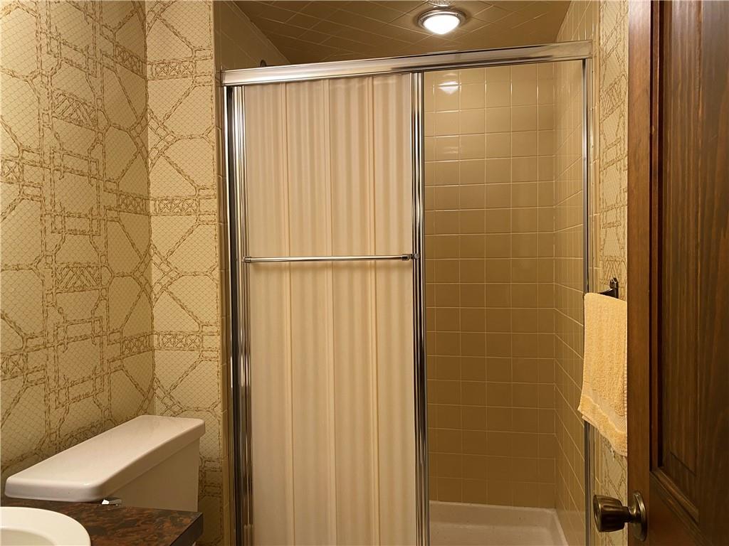 7919 Mt Carmel Road Verona, PA 15147 - Photo 31 of 38 a bathroom with a shower