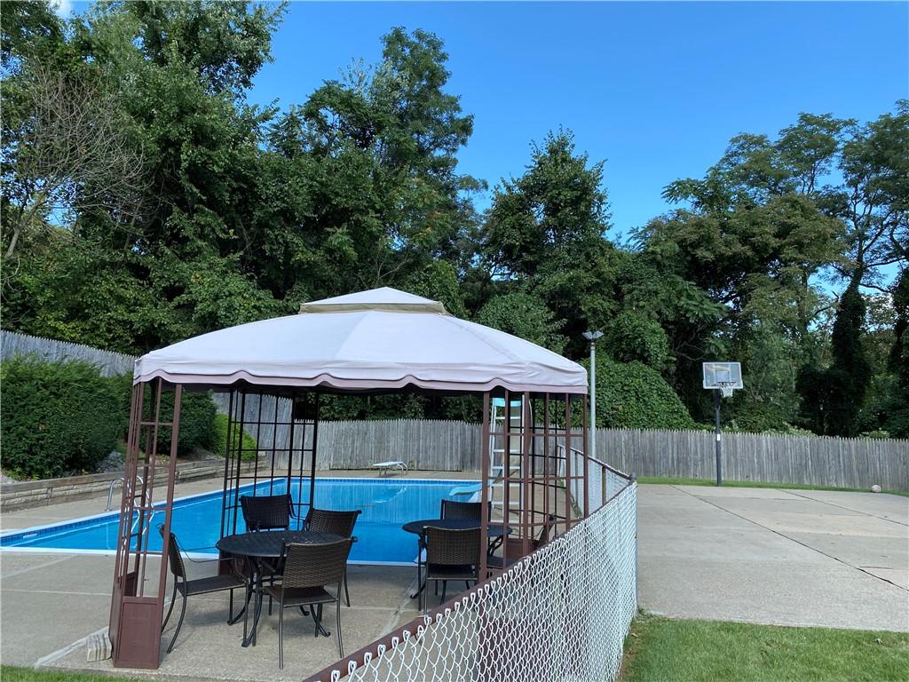 7919 Mt Carmel Road Verona, PA 15147 - Photo 37 of 38 a view of backyard with outdoor seating and green space