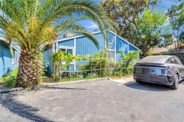 a house view with a garden space