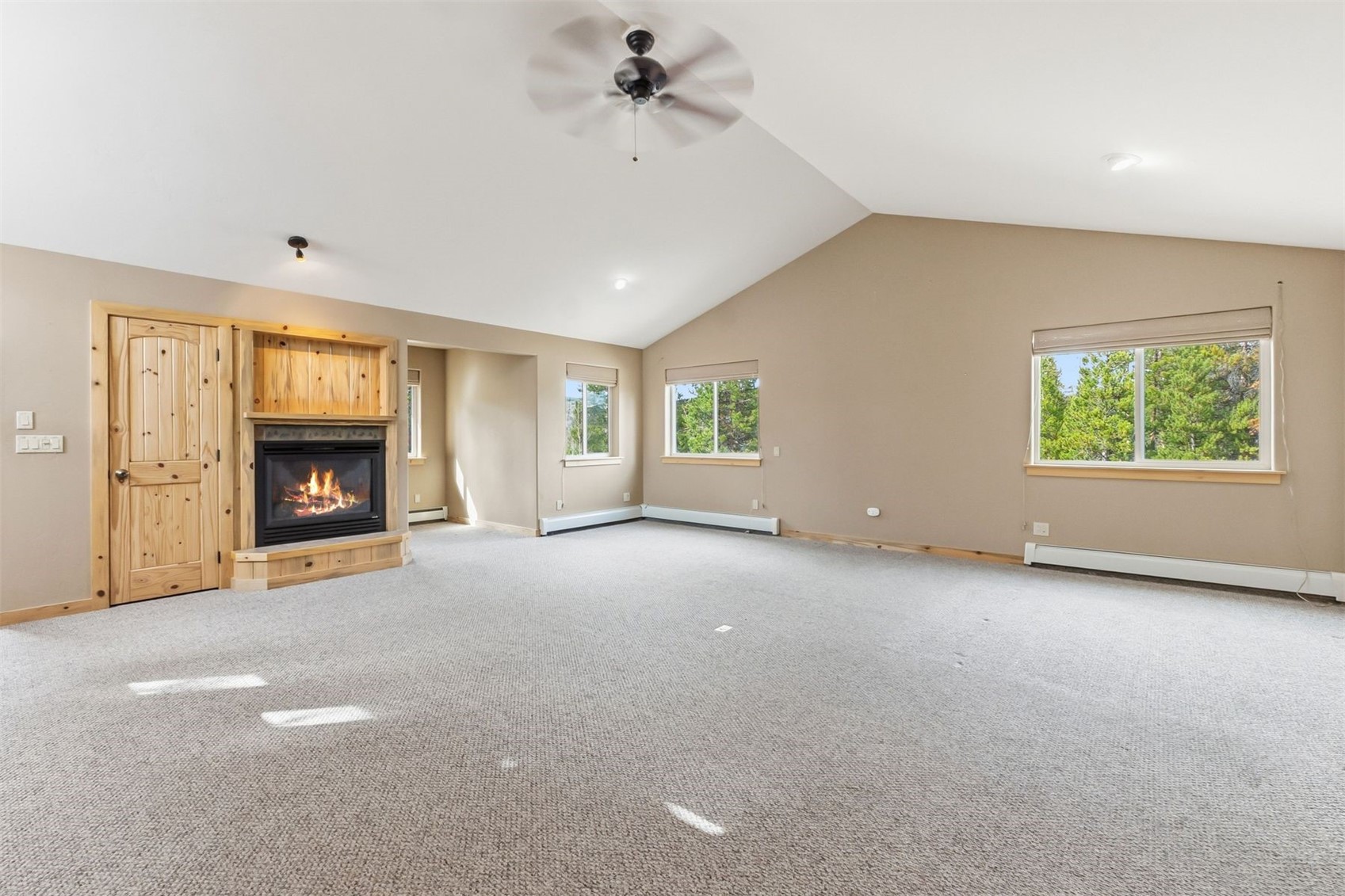 515 Pitkin Street Frisco, CO 80443 - Photo 31 of 50 a view of an empty room with a fireplace and a window