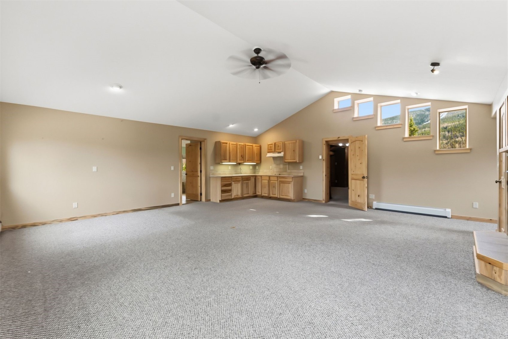 515 Pitkin Street Frisco, CO 80443 - Photo 32 of 50 an empty room with a empty space and a ceiling fan