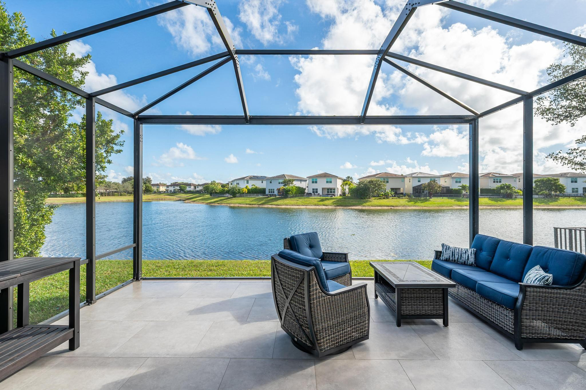 4164 Rosa Drive Deerfield Beach, FL 33064 - Photo 22 of 50 a view of swimming pool with outdoor seating