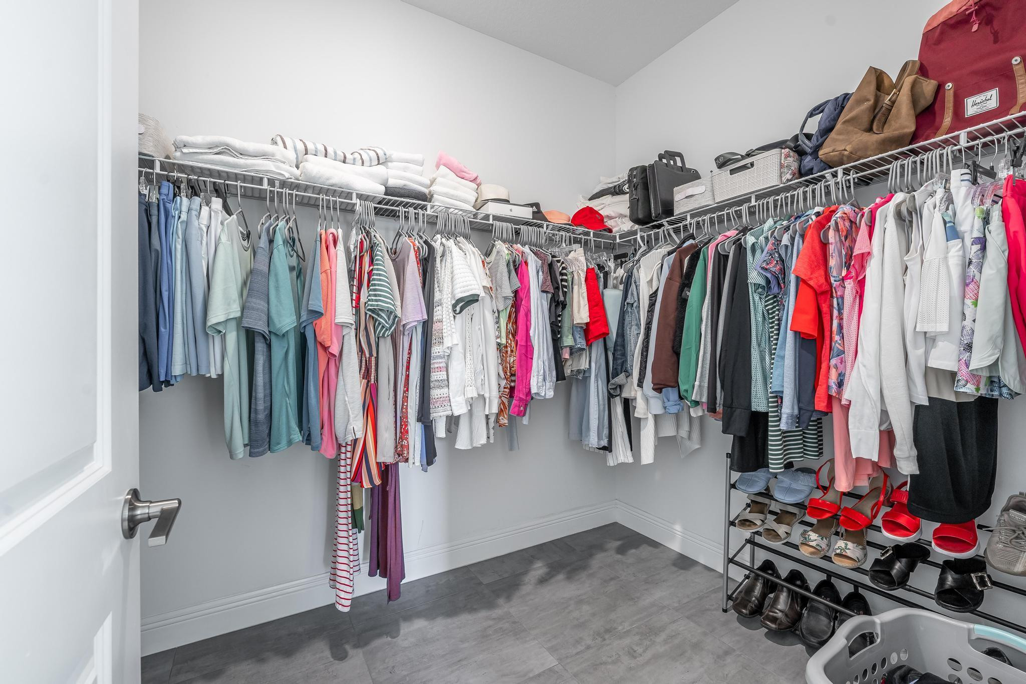 4164 Rosa Drive Deerfield Beach, FL 33064 - Photo 35 of 50 a view of walk in closet with clothes